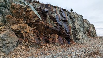 Large outcrop with copper staining at Saint John